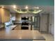 Bright kitchen featuring stainless steel appliances and light wood cabinets at 3151 Carlos Dr, Dunedin, FL 34698