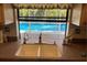 Kitchen sink with a view of the refreshing backyard pool at 3151 Carlos Dr, Dunedin, FL 34698