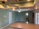Light and airy living room with a view into the kitchen at 3151 Carlos Dr, Dunedin, FL 34698