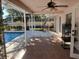 Screened patio overlooking the pool at 3151 Carlos Dr, Dunedin, FL 34698