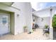 Front entry with tiled patio and charming decor at 3920 Trophy Blvd # 6, New Port Richey, FL 34655