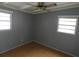 Spacious bedroom with wood flooring and neutral walls at 4011 W Mango Ave, Tampa, FL 33616