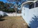 Backyard with fenced area and grassy lawn at 4230 Lee Rd, Spring Hill, FL 34608