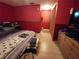Main bedroom with king-size bed and wood flooring at 4230 Lee Rd, Spring Hill, FL 34608