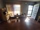 Small dining area with table and chairs near entry at 4230 Lee Rd, Spring Hill, FL 34608