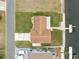 Bird's-eye view of house, driveway and canal-side lot at 4270 Paradise Cir, Hernando Beach, FL 34607