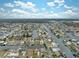Aerial view of canal front community with many houses and boats at 4270 Paradise Cir, Hernando Beach, FL 34607