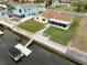 Property features a waterfront lot, private dock, and boat at 4270 Paradise Cir, Hernando Beach, FL 34607