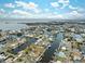 Aerial view of a waterfront community with canals and many houses at 4270 Paradise Cir, Hernando Beach, FL 34607