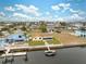 Aerial view of waterfront property with canal access and boat slip at 4270 Paradise Cir, Hernando Beach, FL 34607