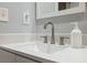 Modern bathroom with white sink and brushed nickel faucet at 4270 Paradise Cir, Hernando Beach, FL 34607