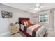 Bright bedroom with water views and ceiling fan at 4270 Paradise Cir, Hernando Beach, FL 34607