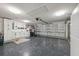 Bright and spacious garage workshop, complete with built-in cabinets and workbenches at 4270 Paradise Cir, Hernando Beach, FL 34607