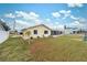 Cute yellow house with a large backyard at 4270 Paradise Cir, Hernando Beach, FL 34607