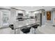 Modern kitchen with stainless steel appliances and granite island at 4270 Paradise Cir, Hernando Beach, FL 34607