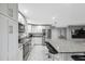 Modern kitchen with stainless steel appliances and granite island at 4270 Paradise Cir, Hernando Beach, FL 34607