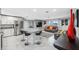 Open concept kitchen and living area with granite island at 4270 Paradise Cir, Hernando Beach, FL 34607