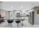 Modern kitchen with stainless steel appliances and granite countertops at 4270 Paradise Cir, Hernando Beach, FL 34607