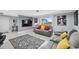 Relaxing living area with gray sofas and a large-screen TV at 4270 Paradise Cir, Hernando Beach, FL 34607
