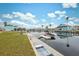 Kayak on the bank, looking towards the canal at 4270 Paradise Cir, Hernando Beach, FL 34607