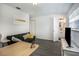 Comfortable bedroom with a TV and en-suite bathroom at 4602 W Hawthorne Rd, Tampa, FL 33611