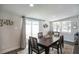 Bright dining room with sliding door access to backyard at 4602 W Hawthorne Rd, Tampa, FL 33611