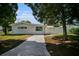House exterior with driveway and landscaping at 4602 W Hawthorne Rd, Tampa, FL 33611