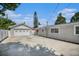 Exterior view of garage and house side at 4602 W Hawthorne Rd, Tampa, FL 33611