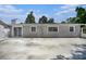 House exterior showcasing rear and driveway at 4602 W Hawthorne Rd, Tampa, FL 33611