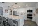 Modern kitchen with white cabinets, stainless steel appliances, and island at 4602 W Hawthorne Rd, Tampa, FL 33611