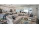 Open concept kitchen and living area with modern appliances and seating at 4602 W Hawthorne Rd, Tampa, FL 33611