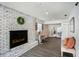 Cozy living room with fireplace and built-in bench seating at 4602 W Hawthorne Rd, Tampa, FL 33611