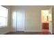 Bright bedroom with hardwood floors and en-suite bathroom at 4634 Mapletree Loop, Wesley Chapel, FL 33544