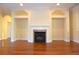 Living room fireplace with built-in shelving at 4634 Mapletree Loop, Wesley Chapel, FL 33544