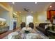 Living room with fireplace and hardwood floors at 4634 Mapletree Loop, Wesley Chapel, FL 33544