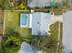 Aerial view showcasing house, pool, and yard at 5302 36Th Avenue W Dr, Bradenton, FL 34209