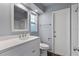 Clean bathroom with white vanity, toilet and updated fixtures at 5302 36Th Avenue W Dr, Bradenton, FL 34209