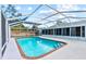 Inviting screened pool with brick coping and large patio area at 5302 36Th Avenue W Dr, Bradenton, FL 34209