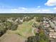 Aerial view of a neighborhood golf course at 5493 Legend Hills Ln, Spring Hill, FL 34609