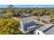 Aerial view of a two-story house and a neighboring home at 5742 Meadowlane St, New Port Richey, FL 34652
