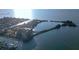 Aerial view of waterfront condo building with marina access at 5915 Sea Ranch Dr # 704, Hudson, FL 34667