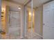 Bathroom with shower/tub and mirrored closet at 5915 Sea Ranch Dr # 704, Hudson, FL 34667