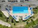 Relaxing condo pool area with ample lounge chairs at 5915 Sea Ranch Dr # 704, Hudson, FL 34667