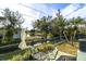 Backyard patio with water view and seating area at 6650 Hickorywood Ln # 6650, New Port Richey, FL 34653