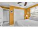 Bedroom with white bedding and closet at 6650 Hickorywood Ln # 6650, New Port Richey, FL 34653