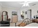 Bedroom with dresser and view of another room at 6650 Hickorywood Ln # 6650, New Port Richey, FL 34653