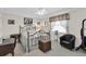 Bedroom with iron bed and sitting chair at 6650 Hickorywood Ln # 6650, New Port Richey, FL 34653