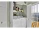 Laundry closet with washer and dryer at 6650 Hickorywood Ln # 6650, New Port Richey, FL 34653