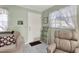 Living room with comfortable seating, a coffee table, and tiled floor at 6650 Hickorywood Ln # 6650, New Port Richey, FL 34653