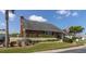 Community recreation center with landscaping at 6650 Hickorywood Ln # 6650, New Port Richey, FL 34653